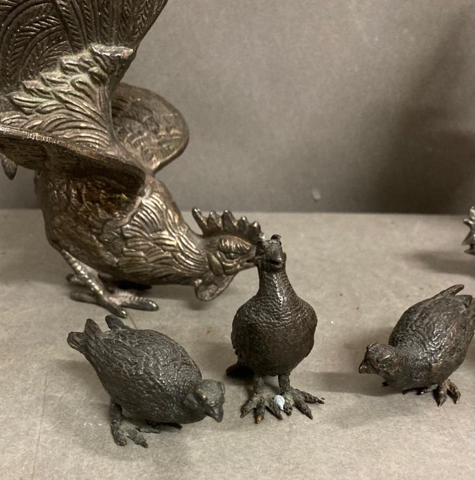 A Pair of white metal fighting cockerels and four bronze style partridge. - Image 3 of 4