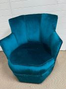 An octagonal cocktail or club chair with peacock blue upholstery (H72cm W71cm SH34cm)