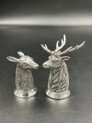 An 800 mark silver salt and pepper in the form of a stag and a deer.