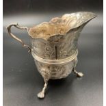 A silver milk jug by James Dixon & Sons Ltd, hallmarked for Sheffield 1895