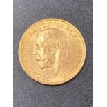 A 1913 Sovereign coin.