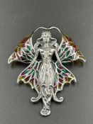 A silver and applique enamel Art Nouveau fairy brooch
