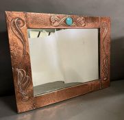 A Liberty copper Art Nouveau copper mirror by Archibald Knox with inset Ruskin 75 cm x 56cm)