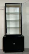 A contemporary open shelving unit with a cabinet below, could be two units (Display H160cm W85cm