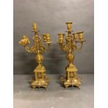 A pair of gilt candelabra centre pieces AF