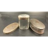 Two hallmarked silver jars and a spare silver lid