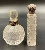Two silver necked scent bottles.