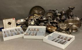 A large volume of silver plate and white metal items to include cutlery coffee pots and candles