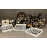 A large volume of silver plate and white metal items to include cutlery coffee pots and candles