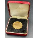 A 1969 150 Dollar Gold coin from Singapore in 22ct gold (Approximate weight 25g)