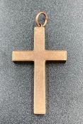 A 9ct gold cross pendant (1.5g approximate total weight)