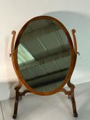 A swivel toilet mirror (H70cm W46cm)