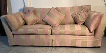 A three seater Duresta sofa, upholstered with a pink and gold striped pattern