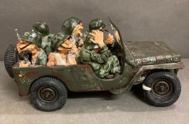 A Limited edition "Tour of Duty" from the vehicles series by Guillermo Forchino Art. This GI Jeep