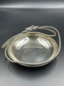 A Lambidis silver bowl with twisted themed handle. (Approximate Total weight 148g)