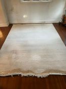 An Indian 100% wool white rug (12FT x 9FT)
