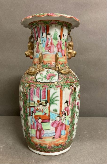 A Famille rose baluster vase painted in the canton style with figural scenes and moulded foo dog - Image 3 of 4