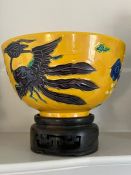 An Kyoto Ware, Fahua style bowl on yellow grounds with dragon decoration with Kochi glaze attributed
