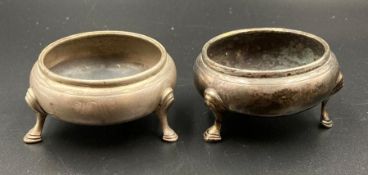 A pair of silver salts without liners.