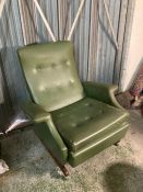 A Mid Century Parker Knoll reclining chair in original upholstery and teak legs
