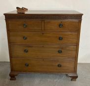 A two over three chest of drawers with circular drop handles and ornate carving to top AF (H197cm
