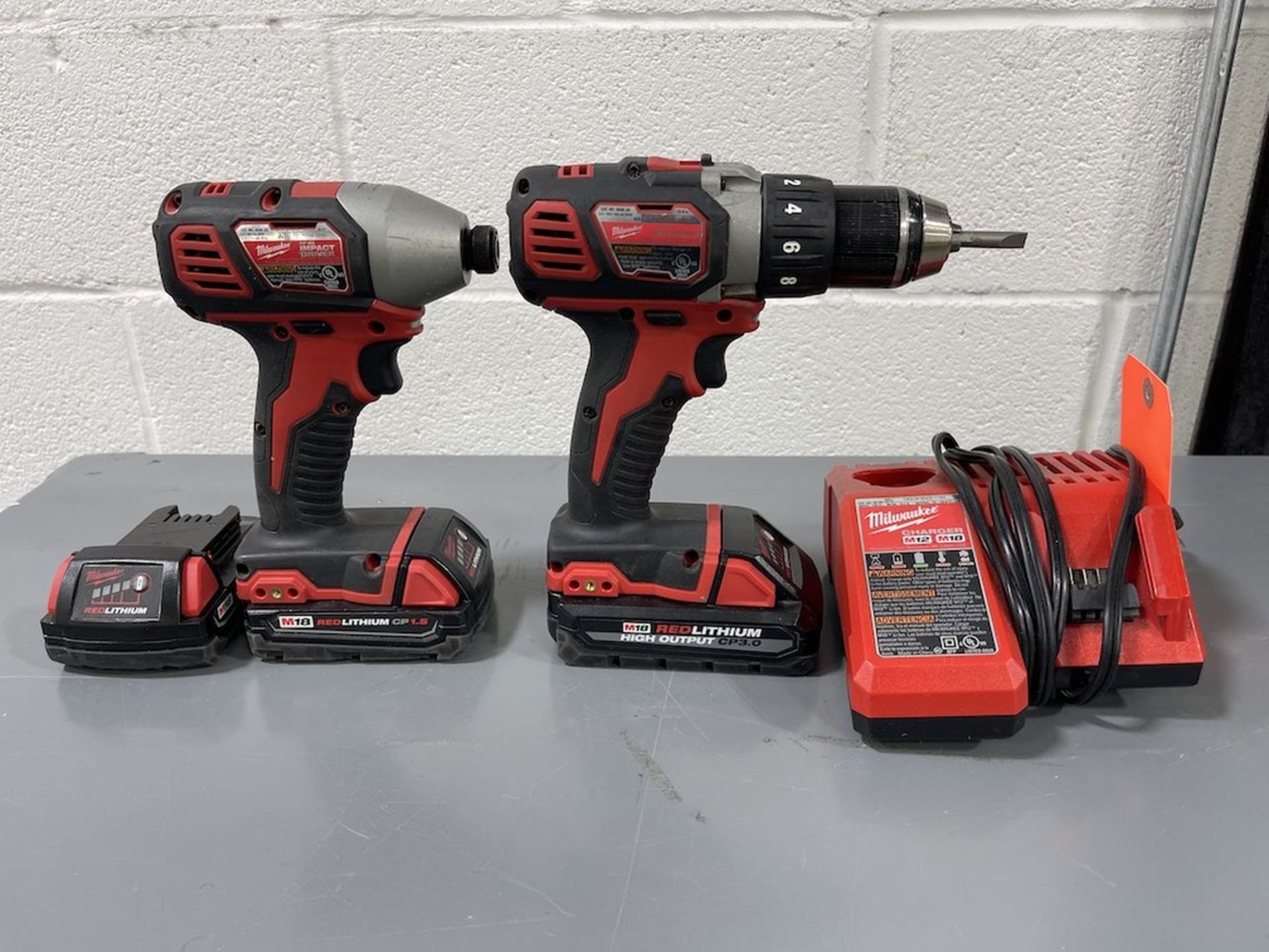 Lot - (1) Milwaukee 1/4 in. 18-V Hex Impact Driver; (1) Milwaukee 1/2 in. 18-V Drill Driver;