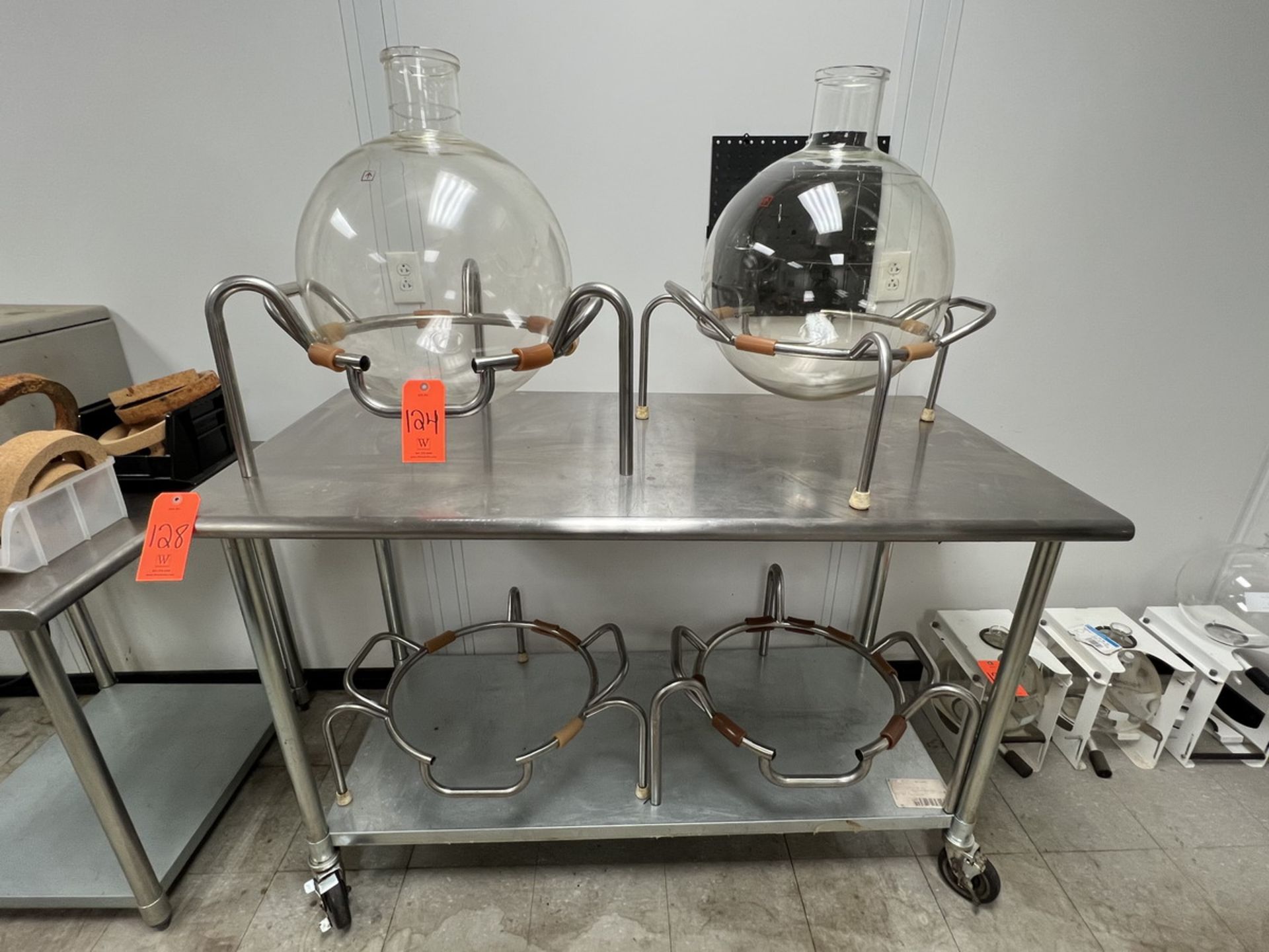 Lot - (2) Various Size Round Chemical Glass Flasks and Stands