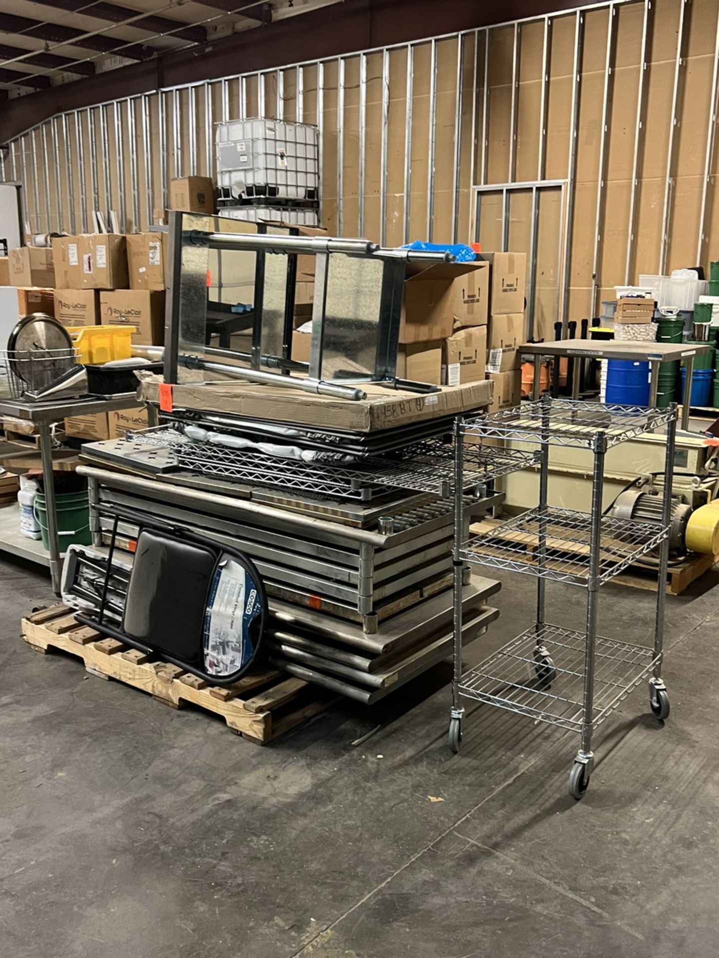 Lot - (10) Assorted Stainless Steel Tables (Disassembled); with (1) Portable Cart, (1) 24 in. wide x