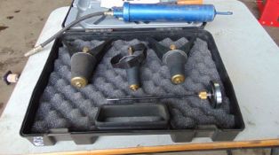 Coolant System Test kit and Grease Gun as shown