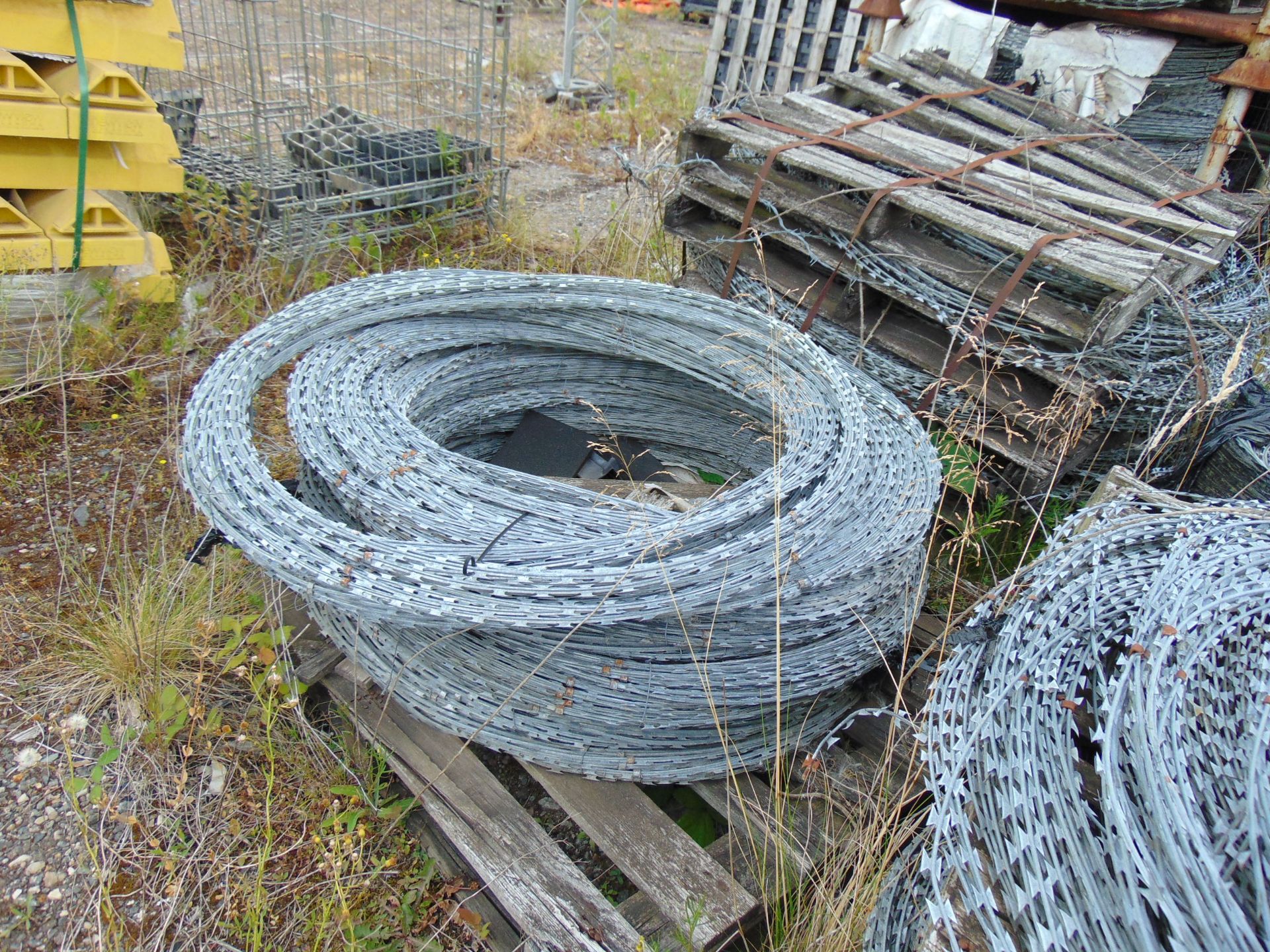 4 x Large Pallets of MoD Galvanised Razer Wire in Expanding Coils Quantity as shown - Image 4 of 6