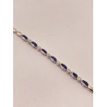 18kt white gold Sapphire and Diamond bracelet, S 0.65 d 0.18ct, stamped 750