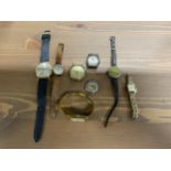 A selection of wristwatches and watch faces, to include a vintage ladies wristwatch with silver