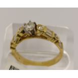 18ct yellow gold and diamond ring, mix of rectangular and round cut stones approx 1.18ct, size O,