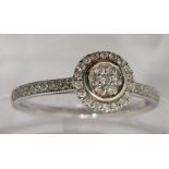 18ct white gold and diamond halo ring 0.25ct, approx size, stamped 750