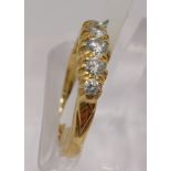 18ct yellow gold diamond ring in graduated half eternity style, approx 0.45cts, hallmarked 750.