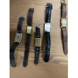 Five wristwatches of rectangular shaped dials, some with subsidiary dials, and a Regolo full