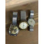 A selection of wristwatches, all with expandable straps, to included a watch with a gold coloured