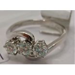 18ct white gold diamond ring, with three stones 0.25ct, approx. gross 0.75ct, approx size L/M,
