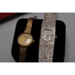 A 9ct gold Swiss made ladies watch with small face, marked with name Limit on the face alongside a