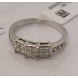 18ct white gold diamond ring, approx 0.70cts, square cut central stones set into three tiered