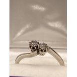 18ct white gold diamond ring in an interlocking twin stone design, approx 0.30cts, size O/P