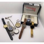 A selection of wristwatches and pocket watches to include a ladies silver pocket watch with chain, a