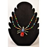 A Butler and Wilson large rainbow / multicoloured spider necklace (approx. size of spider l 7cm x