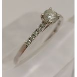 9ct white gold diamond ring, central stone with smaller diamonds to mount, approx 0.36ct, approx
