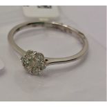 18ct white gold and diamond ring of flower shape design, approx 0.25ct, approx size M/N,