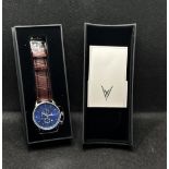 A Vincero collective watch “The chrono S” in blue steel with three subsidiary dials and an aperture,