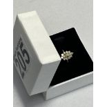 Yellow gold cluster ring featuring x13 round cut diamonds of approx. 0.50ct in marquise design,