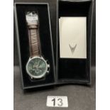 A Vincero collective watch “The chrono S” in green and silver with three subsidiary dials and an