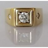 A gents gold and diamond ring, the central brilliant-cut diamond approximately 0.40 carats, stamped