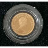 A QEII gold full sovereign in original packaging, 1979
